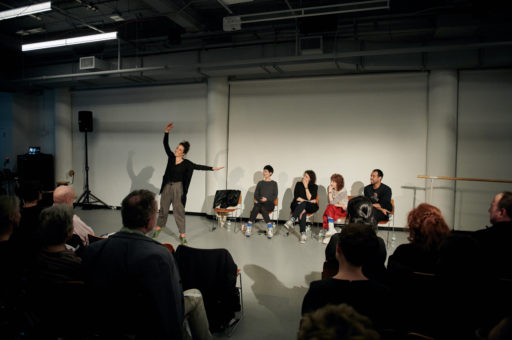 Netta Yerushalmy demonstrates movement during After Merce: Choreographers Responding to Cunningham's Legacy. Photo by Joe Carrotta.